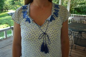 Front of Under Skies Henry Embroidery Detail Tie-Neck Blouse