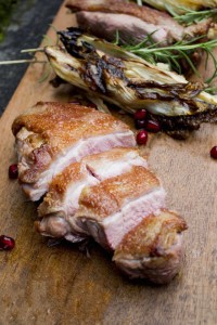 Seared duck breast in a red wine pomegranate sauce